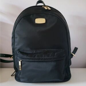 Black Michael Kors Backpack with Gold Accents